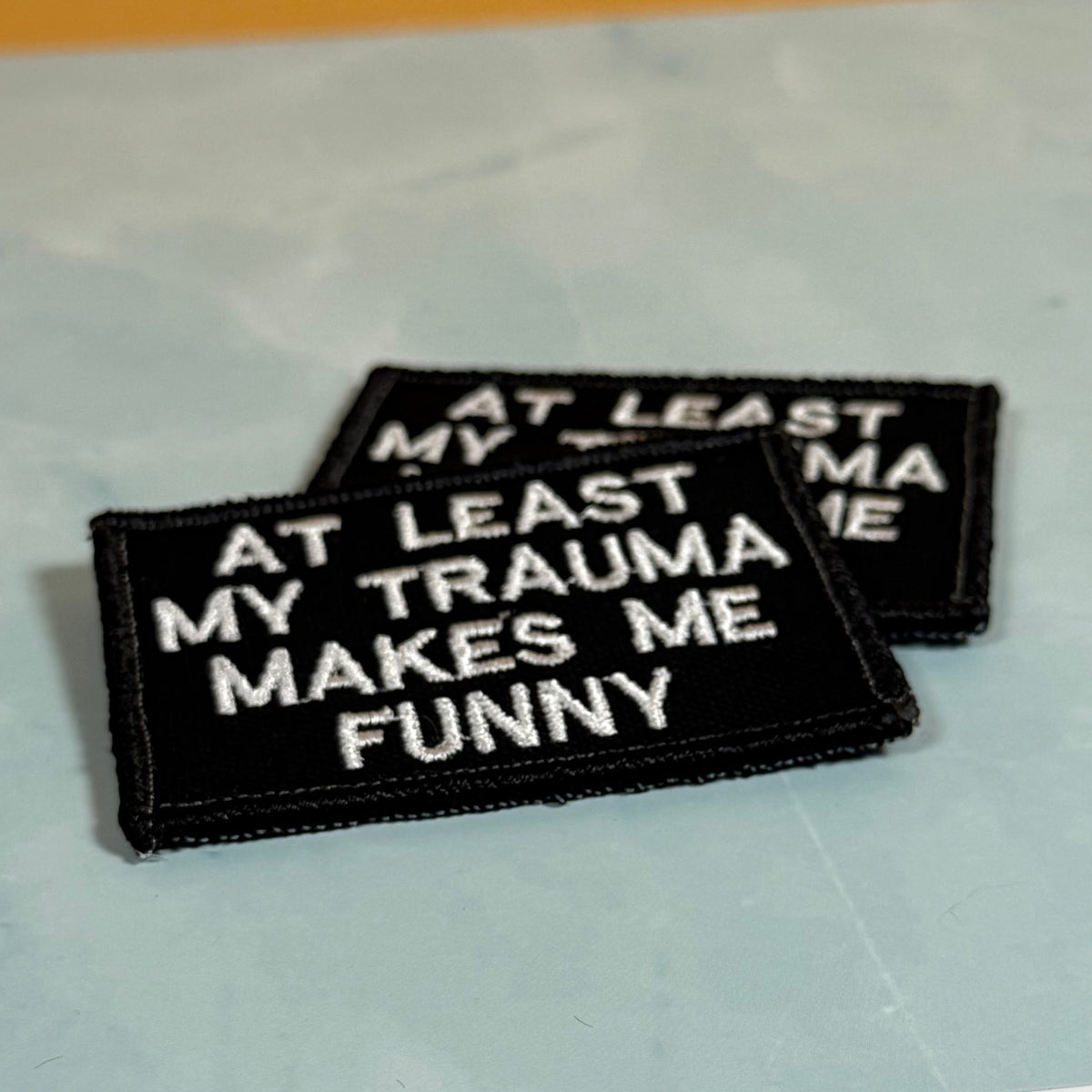 At Least My Trauma Makes Me Funny Morale Patch, 2x3" | Made in USA | VELCRO® Brand Hook Backing